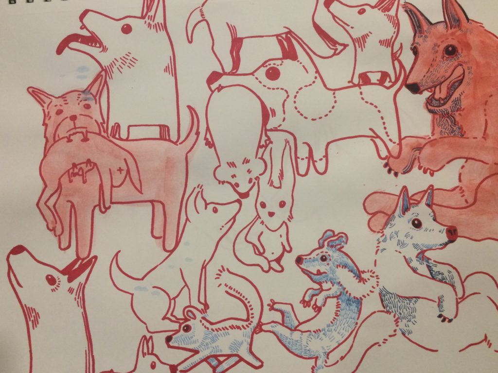 Drawings of dogs in red and blue marker