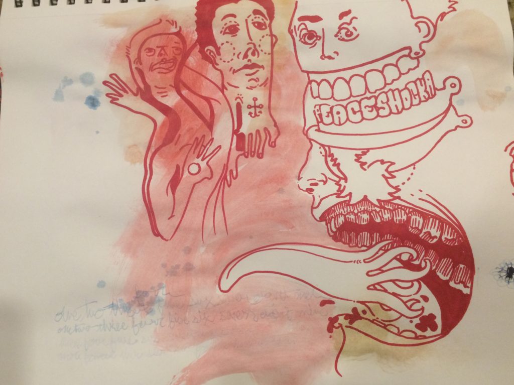 Drawing if faces in red marker